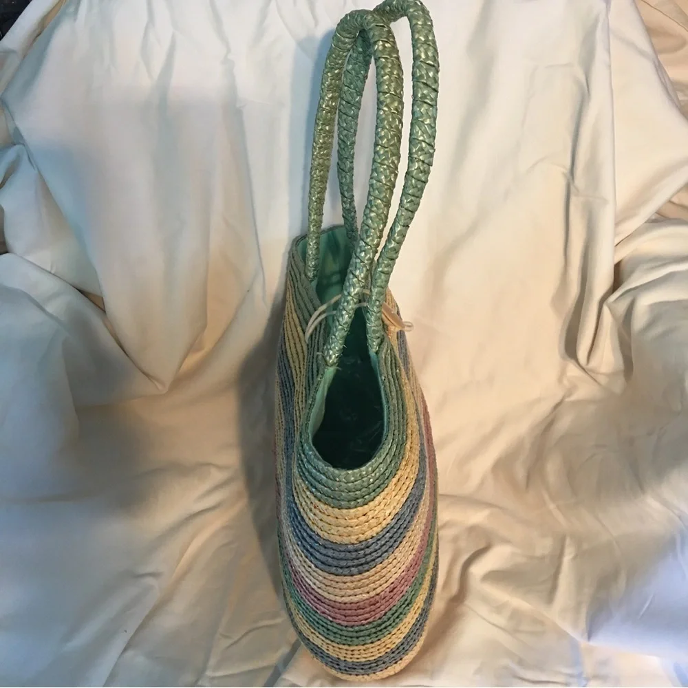 Natural straw bag in green blue, red colors